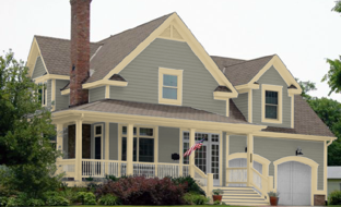 gray-blue siding and cream trim gives a warm feel