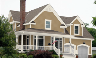 khaki brown siding with white trim gives an earthy look